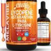 image:imageMelaVibe Internal Tanning Drops Supplement Astaxanthin Lycopene PABA LTyrosine Beta Carotene Grape Seed Polypodium Leucotomos MSM Gotu Kola Amla Copper Selenium Skin Radiance by Clean Nutra 4 Fl Oz